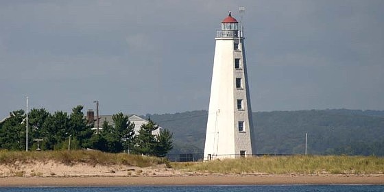 lynde_point_lighthouse_from_water_6_croppedx560x250.jpg